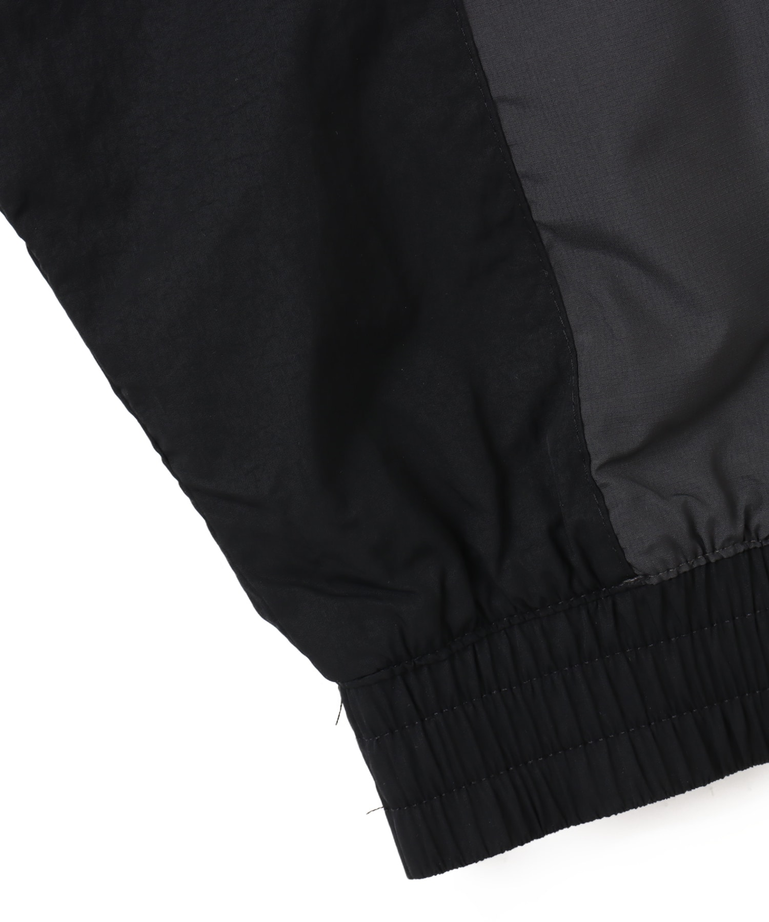 NIKE M NSW TN TRACKTOP WVN BLACK/DK SMOKE GREY/UNIVERSITY REDの画像