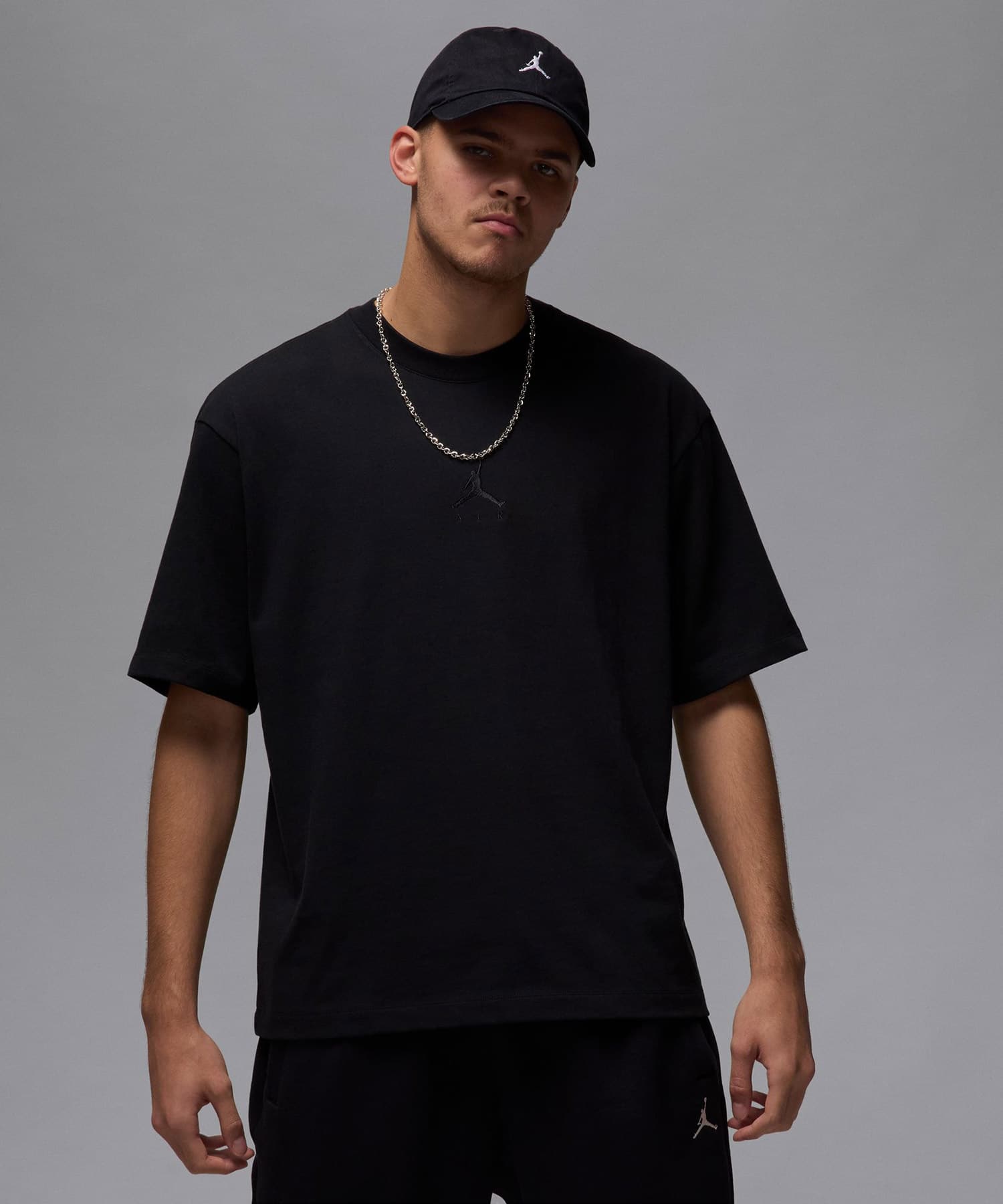 JORDAN BRAND M J FLT ESS OVSZ SS CREW BLACKの画像