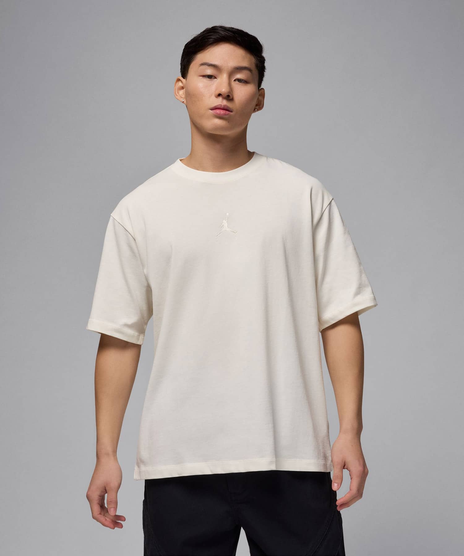 JORDAN BRAND M J FLT ESS OVSZ SS CREW IVORYの画像