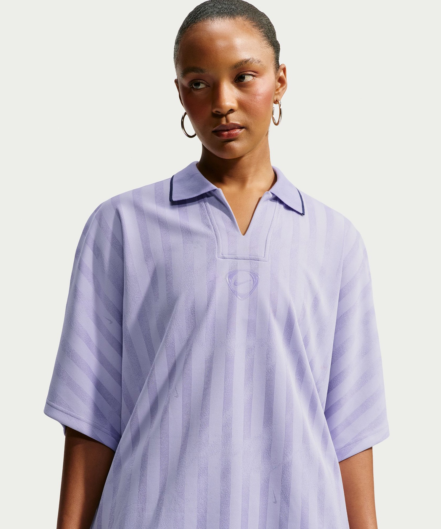 NIKE W RNWY JERSEY TOP PURPLEの画像