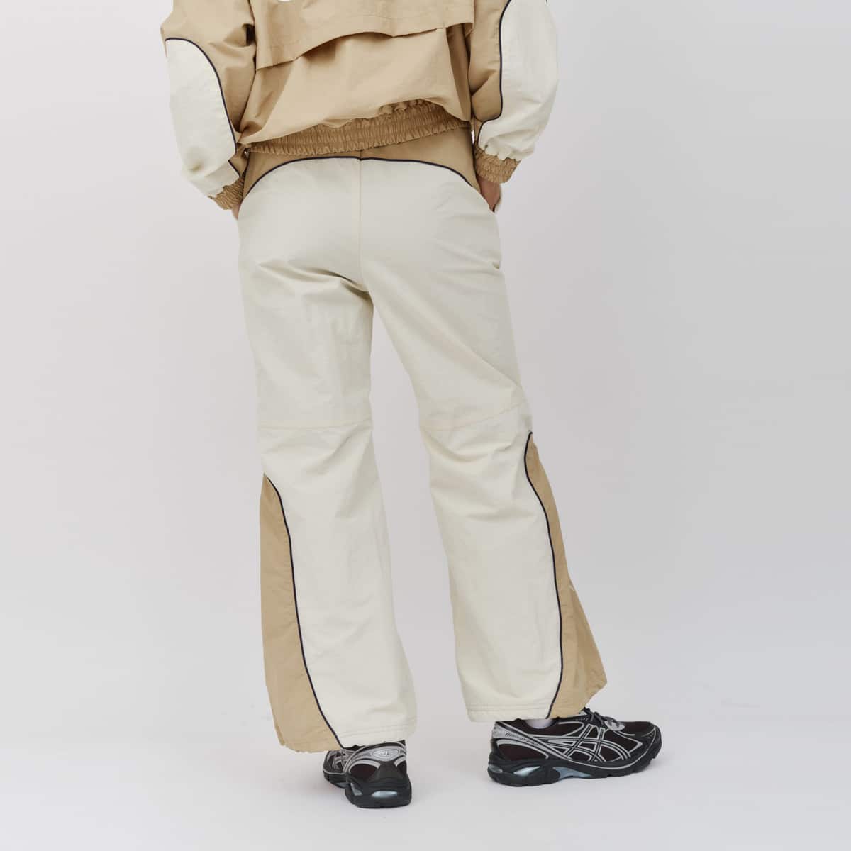 UMBRO × atmos pink Track Pants BEIGEの画像