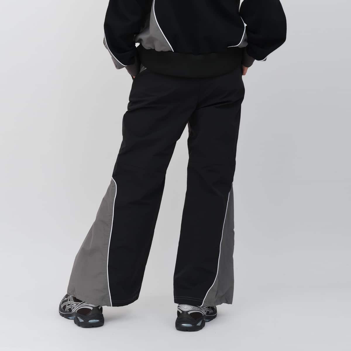 UMBRO × atmos pink Track Pants BLACKの画像