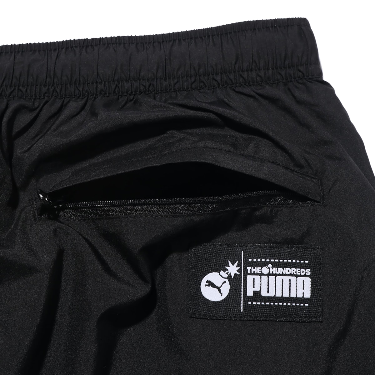 black puma track pants