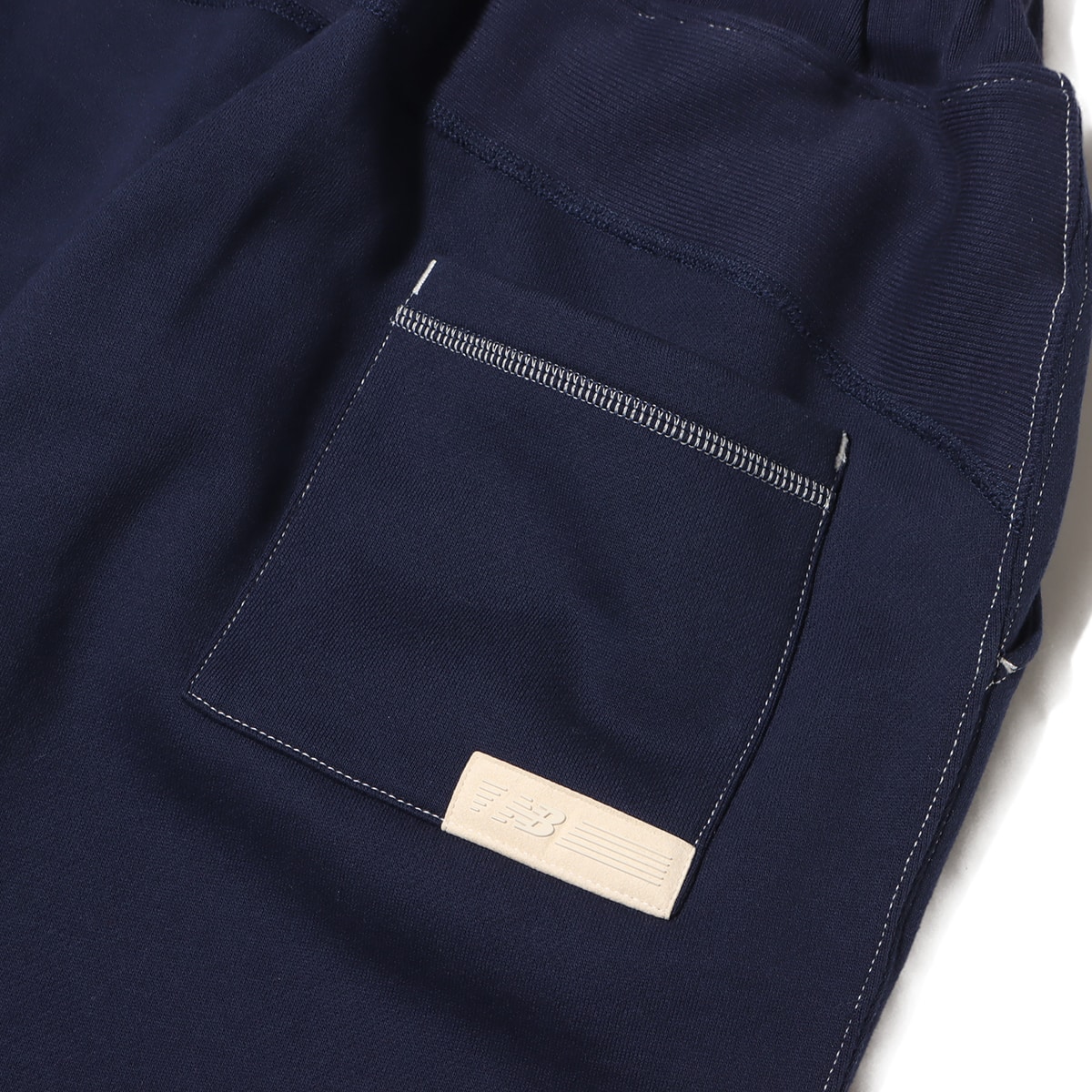 New Balance 1000 SWEAT PANTS OVERSIZED FIT ピグメント 23FA-Iの画像