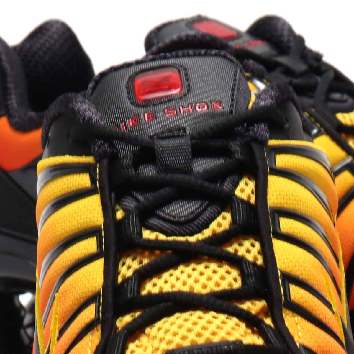 NIKE SHOX TL BLACK/BLACK-AMARILLO-UNIVERSITY RED