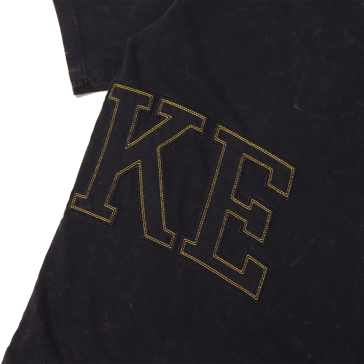 NIKE U NK NRG FADEAWAY TEE BLACK/UNIVERSITY GOLD 22FA-Sの画像