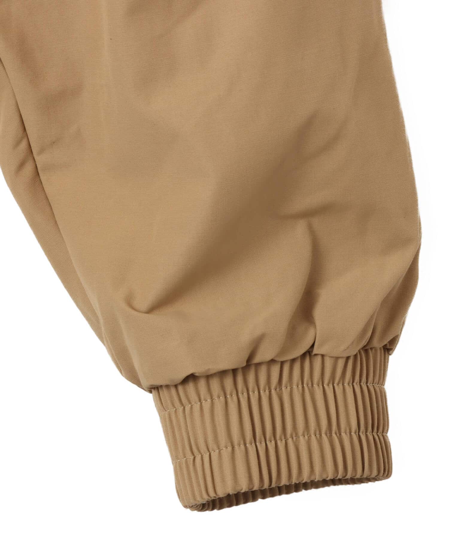 NIKE AS M NK CLUB FUTURA  JKT PARACHUTE BEIGE/WHITEの画像