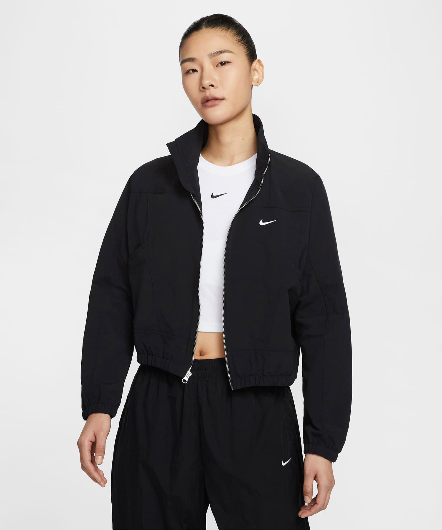 NIKE AS W NSW EVRTHNG WVN RPL UV BLACK/WHITEの画像