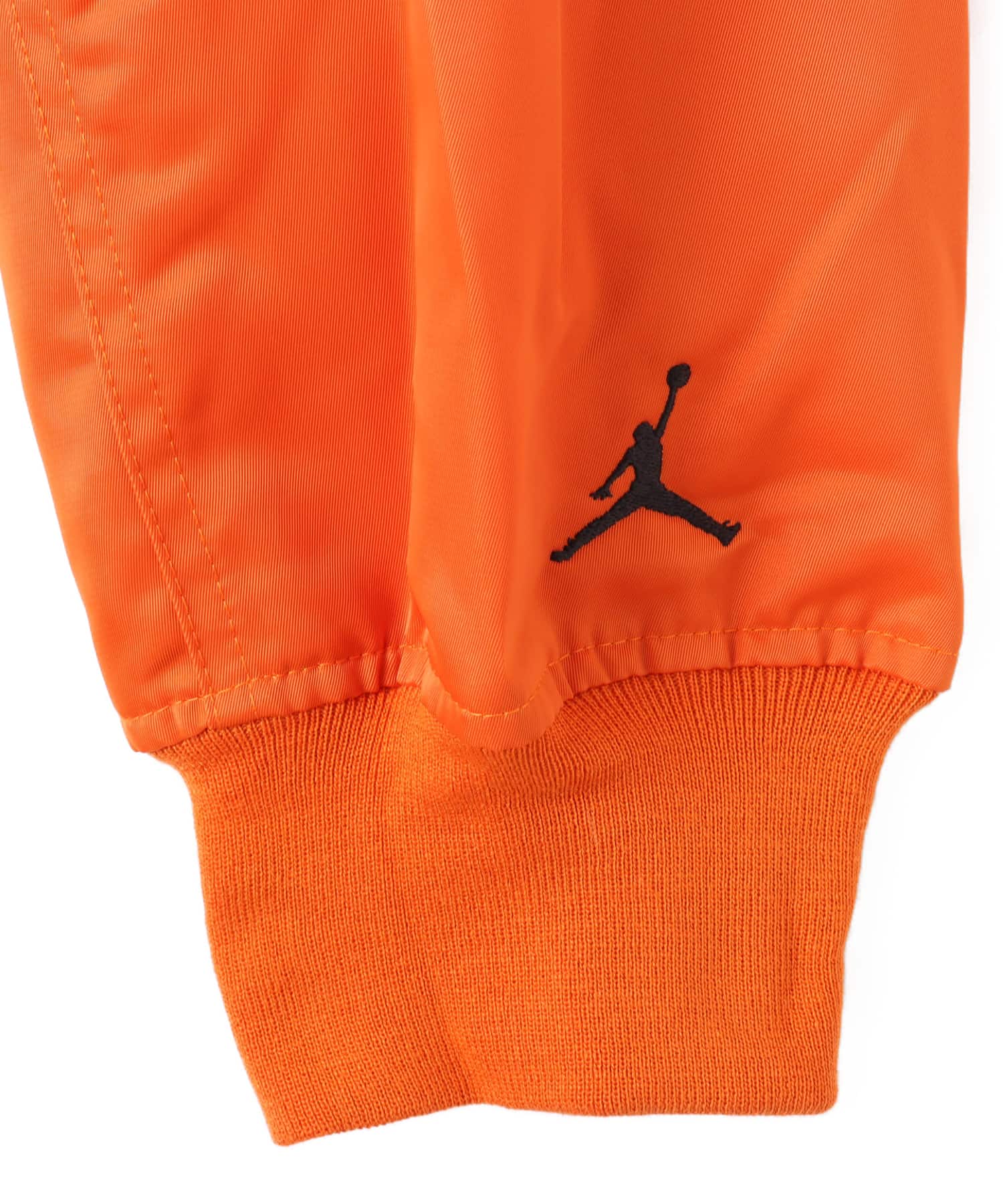 JORDAN BRAND M J BRK CLGTE VRSTY JKT BLACK/STARFISH/BLACKの画像