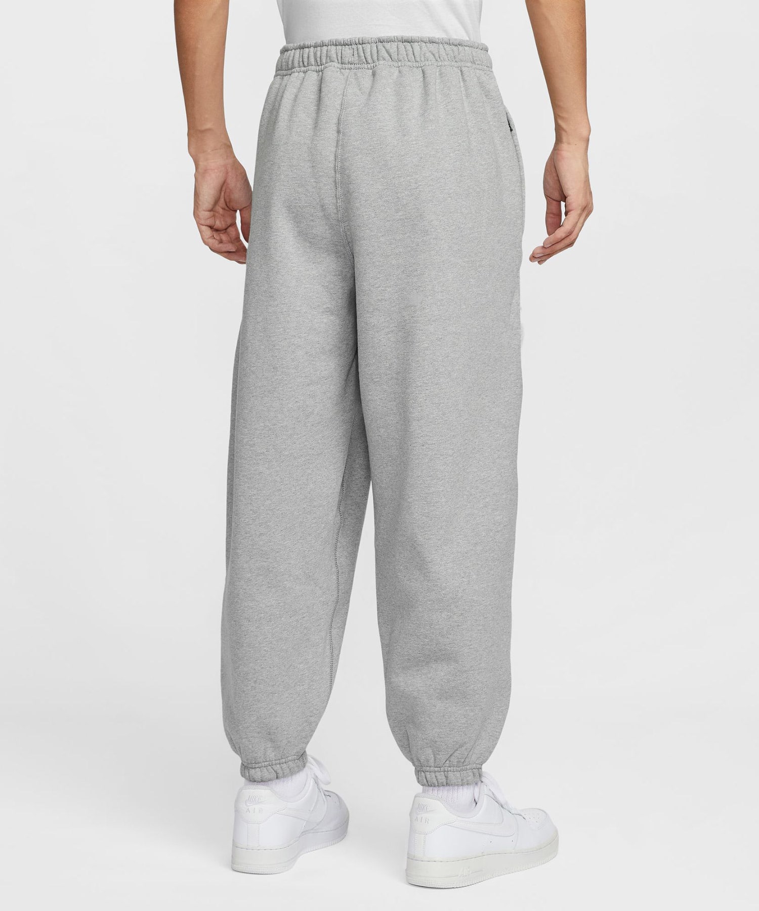 NIKE AS M NL SOLO SWSH BB CF PANT DK GREY HEATHER/LT SMOKE GREY/WHITEの画像