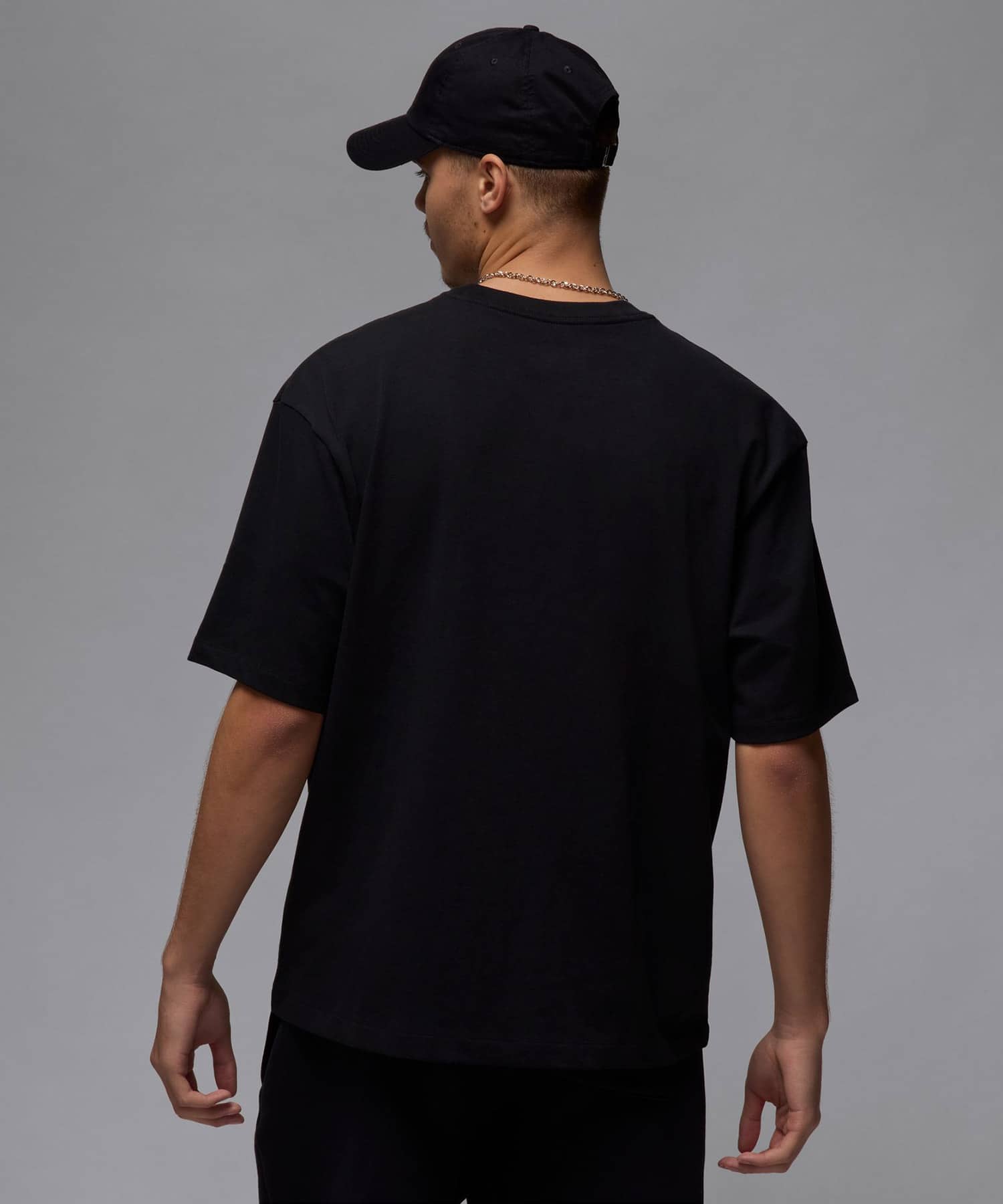 JORDAN BRAND M J FLT ESS OVSZ SS CREW BLACKの画像