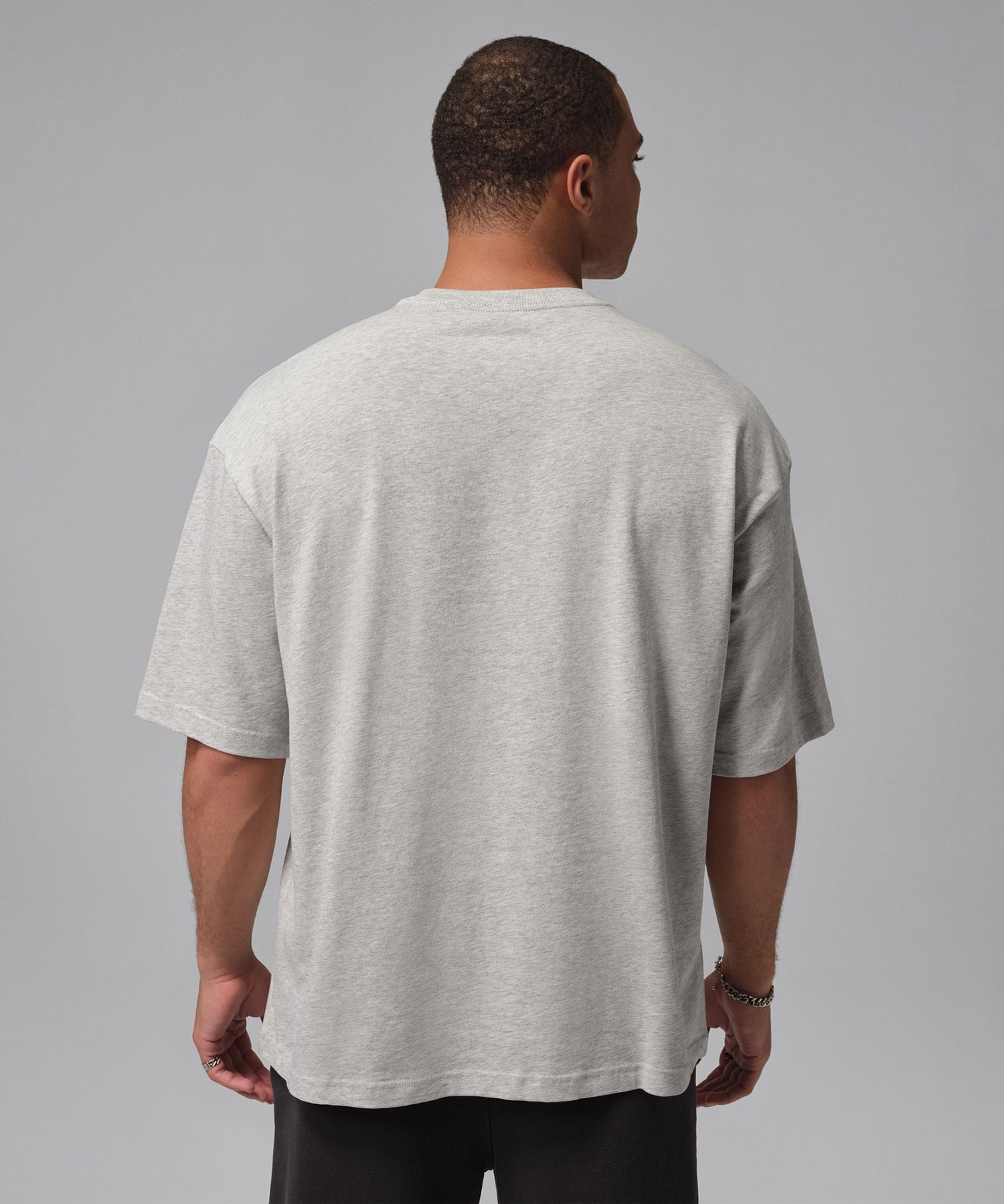 JORDAN BRAND M J FLT ESS OVSZ SS CREW GRAYの画像