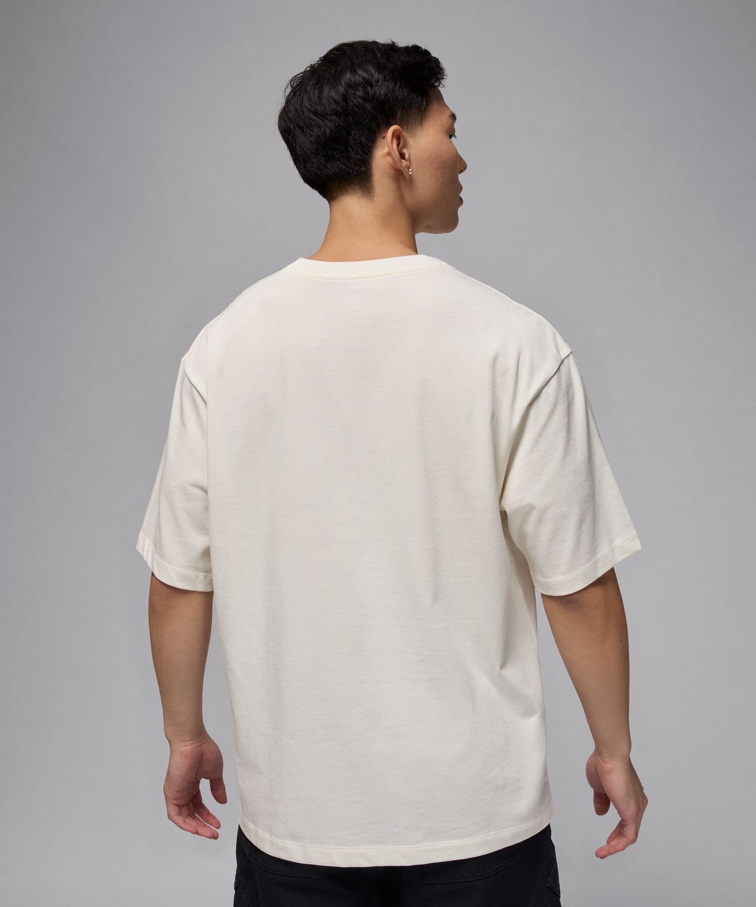 JORDAN BRAND M J FLT ESS OVSZ SS CREW IVORYの画像