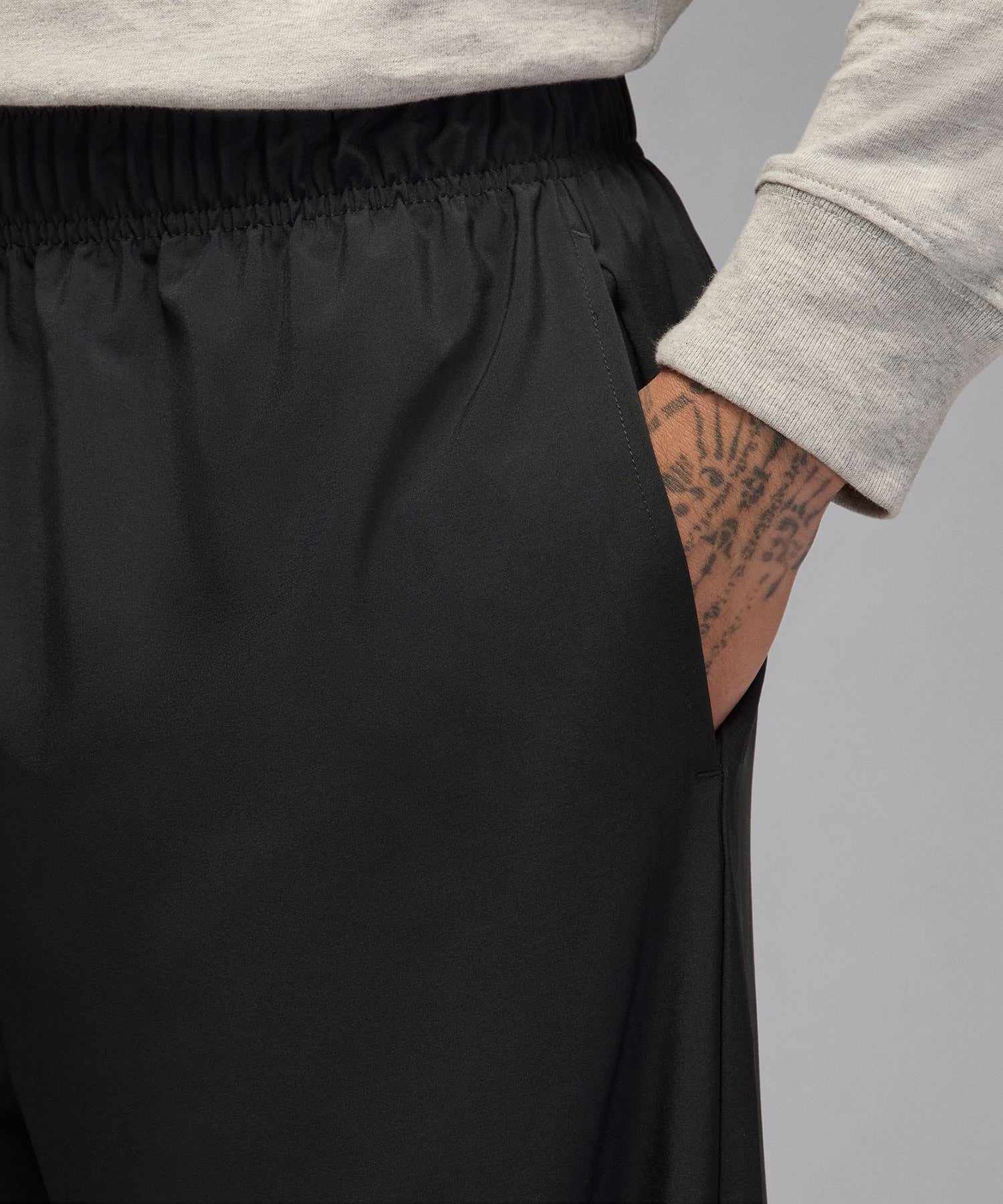 JORDAN BRAND M J DF SPRT WOVEN PANT JT BLACK/UNIVERSITY REDの画像