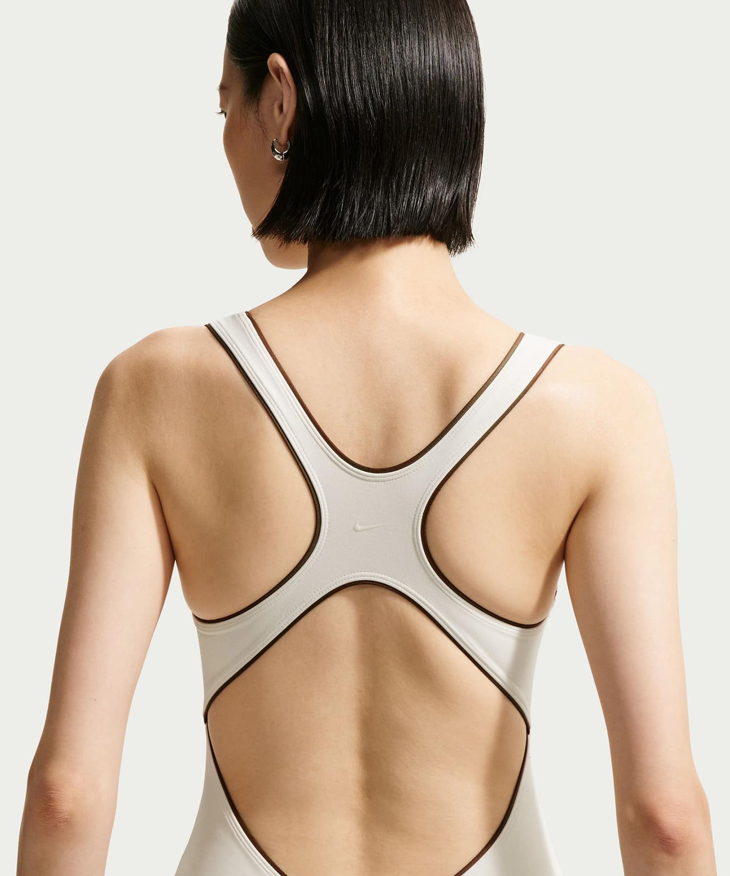 NIKE W NRG NK BODYSUIT OFFWHITEの画像