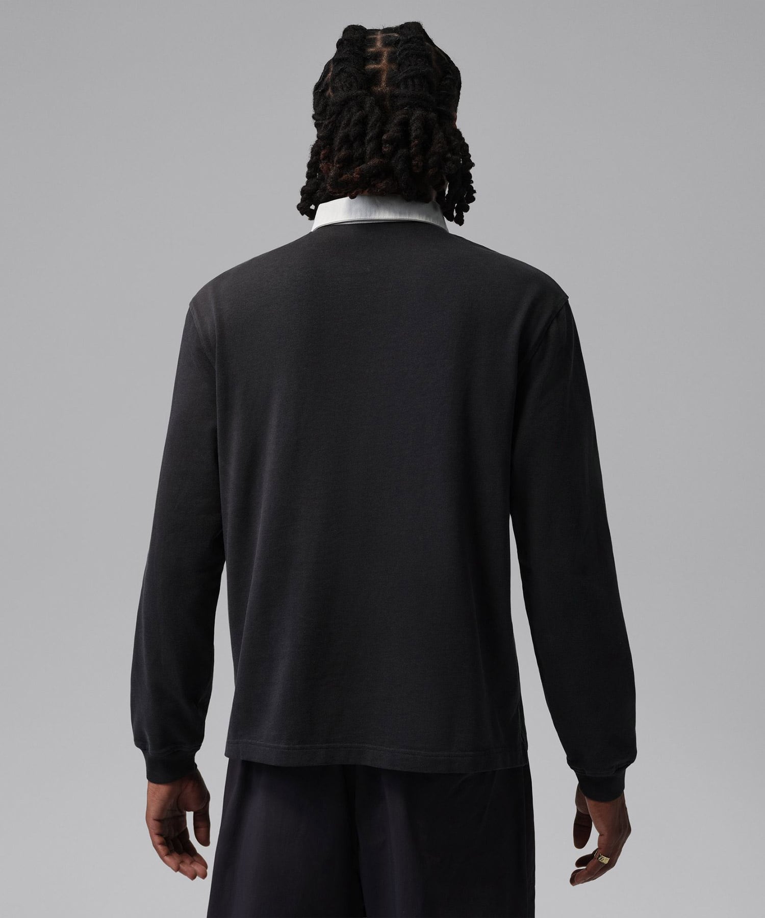 JORDAN BRAND M J FLT ESS RUGBY TOP BLACKの画像
