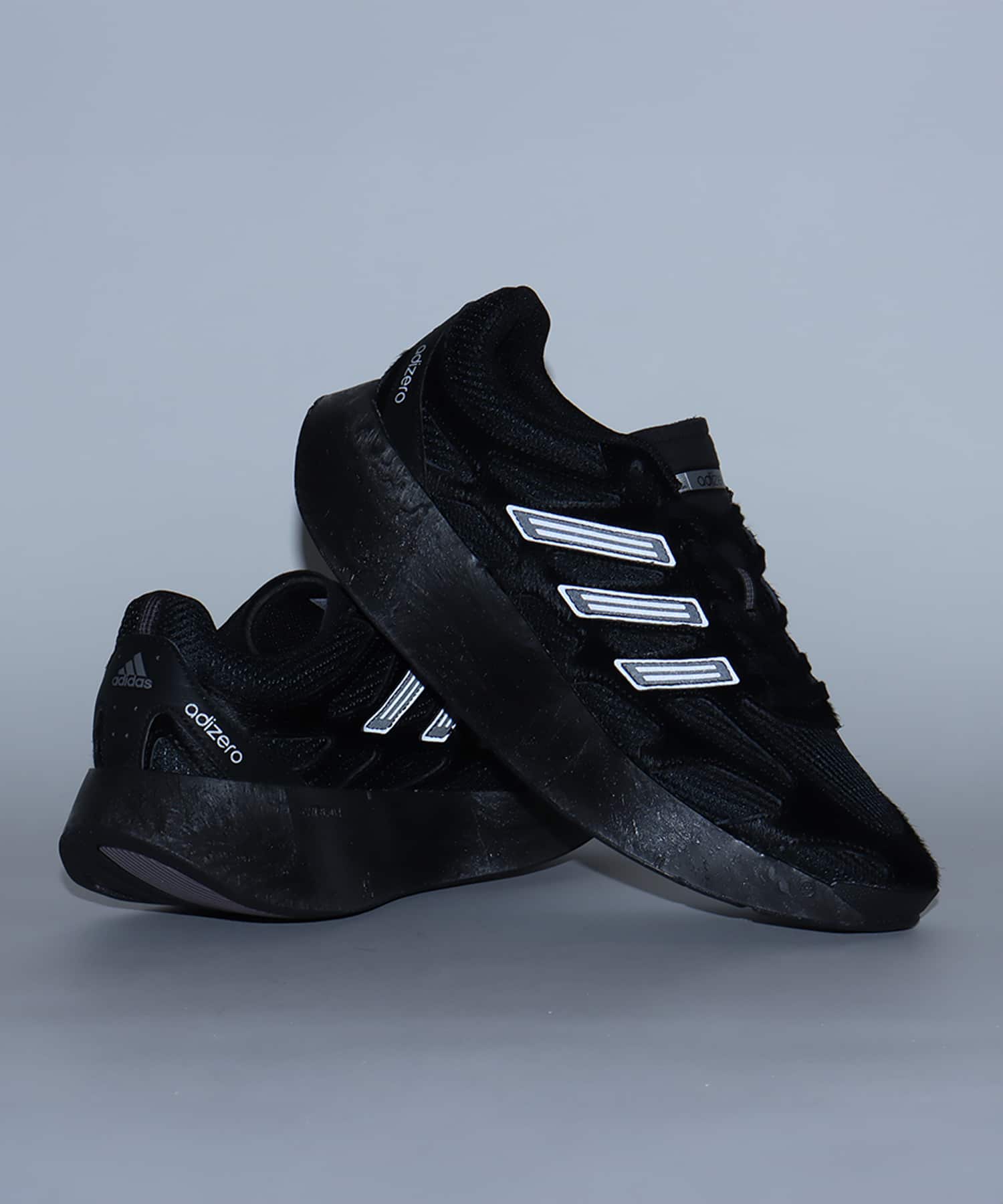 adidas ADIZERO ARUKU CBLACK/CHACOA/IRONMTの画像