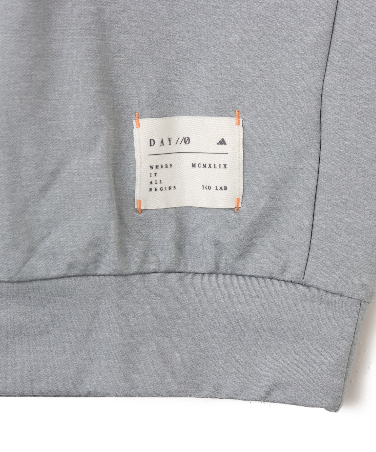 adidas DAY//Ø SWEAT HOODIE U ミディアムグレーヘザーの画像