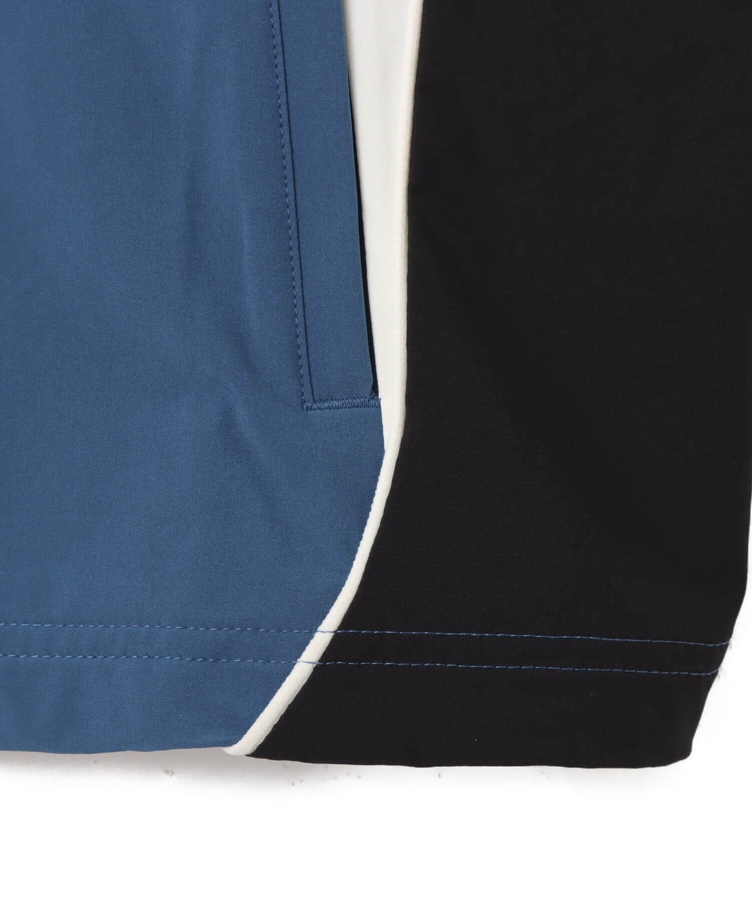 New Balance IN GAME WOVEN TRACK JACKET ダークショアラインブルーの画像