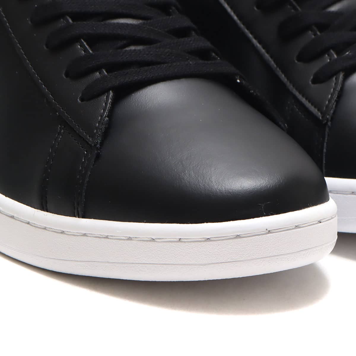 LACOSTE CARNABY EVO BL 21 BLK/WHT 22SU-Iの画像
