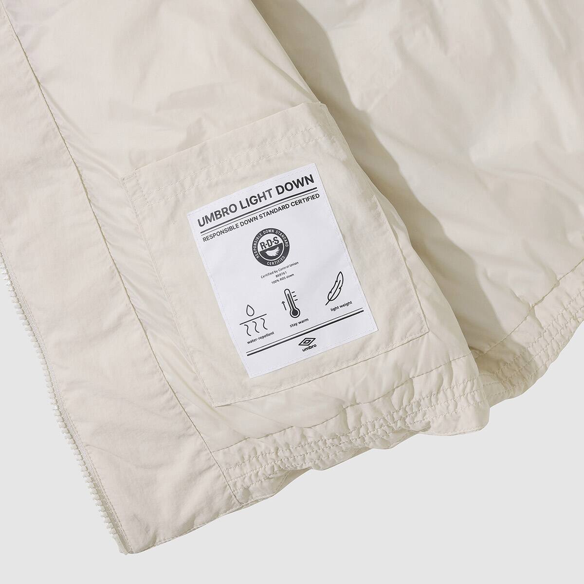 UMBRO Lightweight Down Vest オイスターベージュの画像