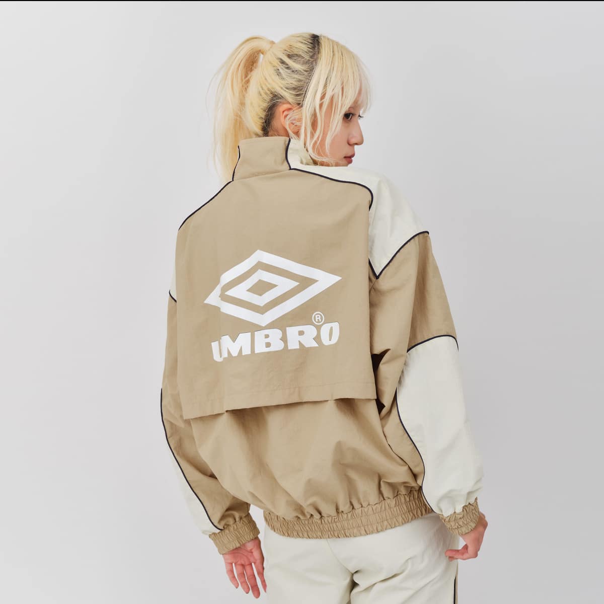 UMBRO × atmos pink Track Jacket BEIGEの画像