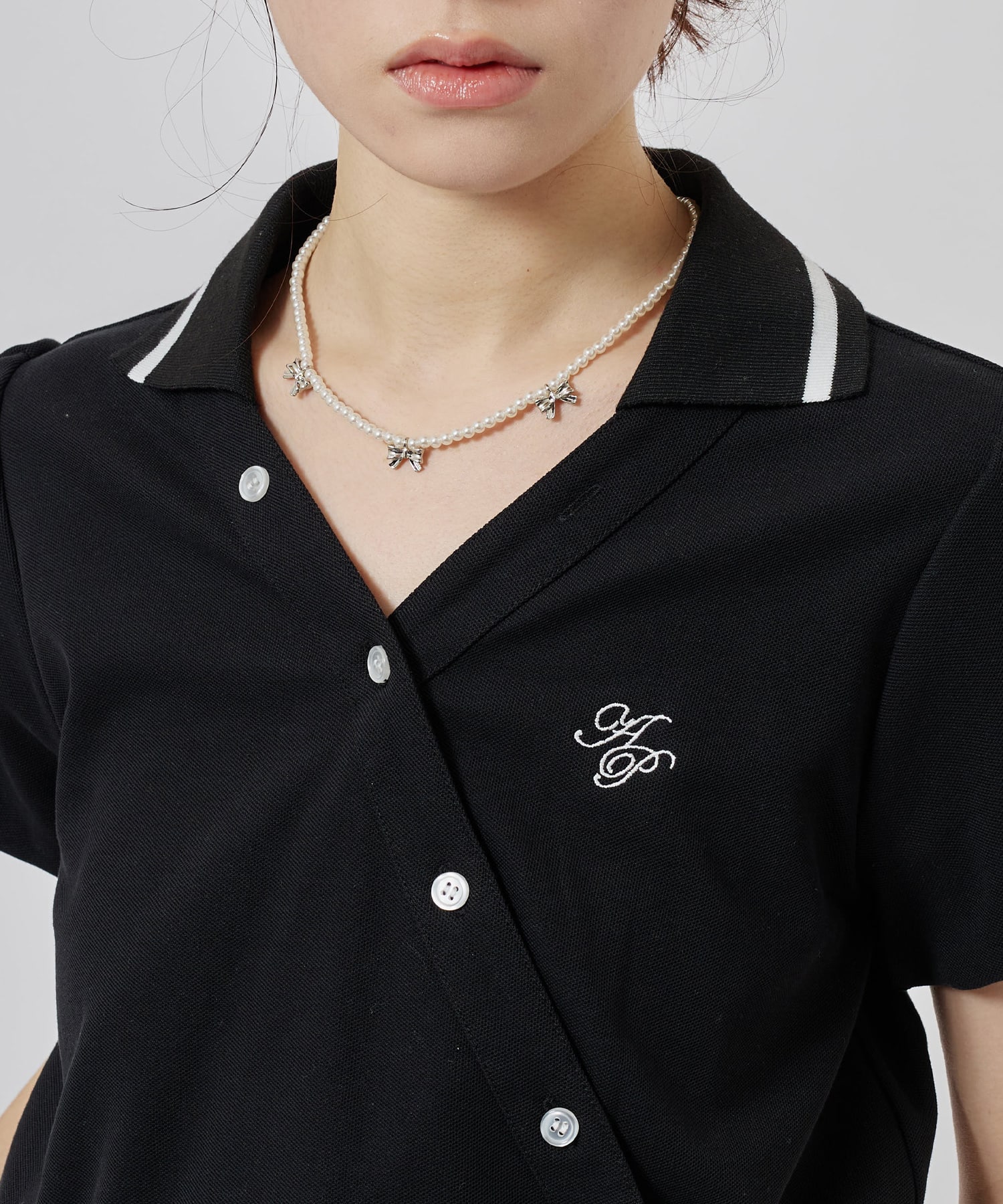 atmos pink Cashe-Coeur Polo Shirt BLACKの画像