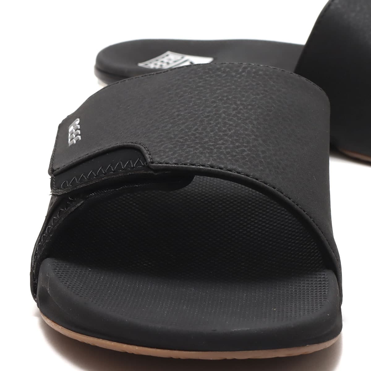 REEF FANNING SLIDE BLACK/SILVER 23SP-I