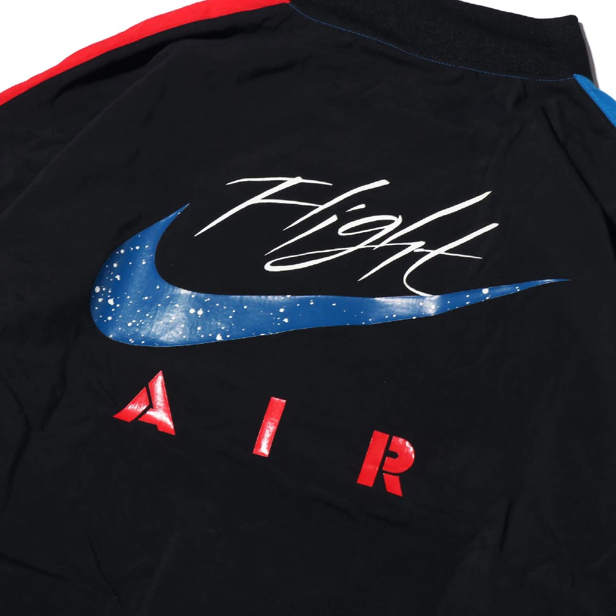 red white and blue jordan shirt