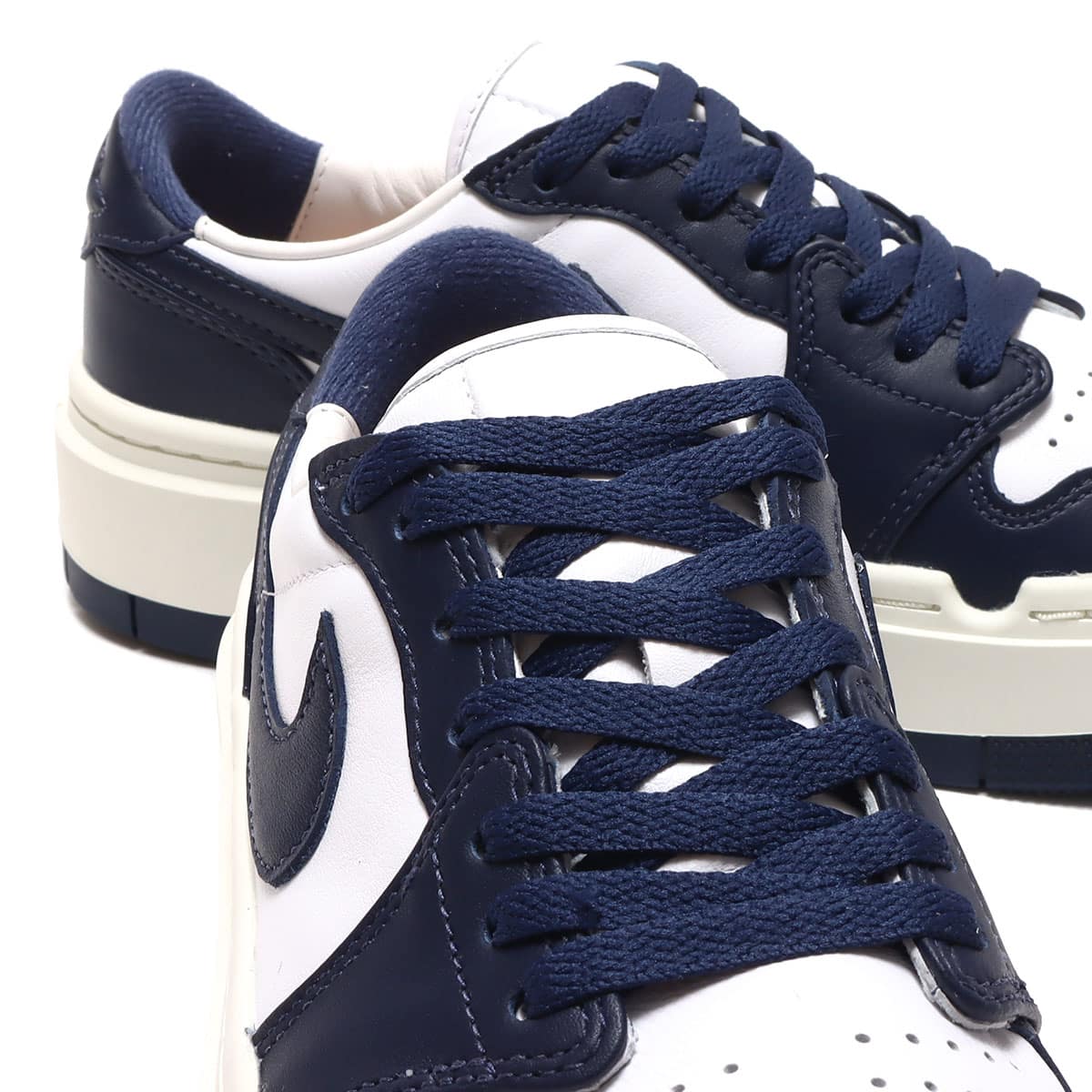 JORDAN BRAND WMNS AIR JORDAN 1 ELEVATE LOW WHITE/MIDNIGHT NAVY