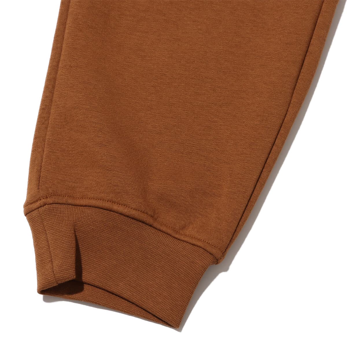 JORDAN BRAND AS M J ESS MMBR HLDY FLC PANT LT BRITISH TAN/SAIL 23HO-Iの画像
