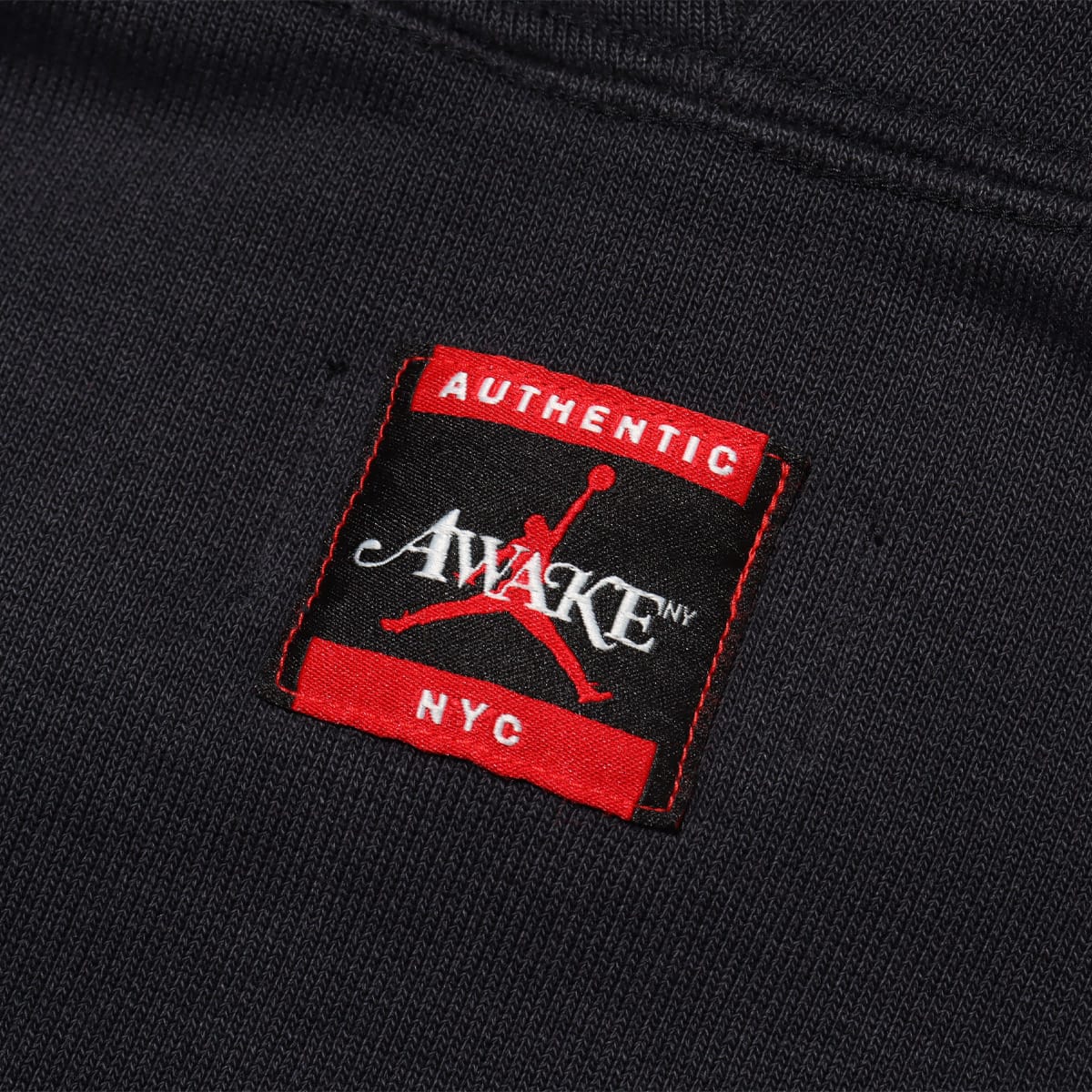 JORDAN BRAND M J AWNY FLC HOODIE BLACK/SAIL/UNIVERSITY RED|atmos（アトモス）  公式オンラインストア