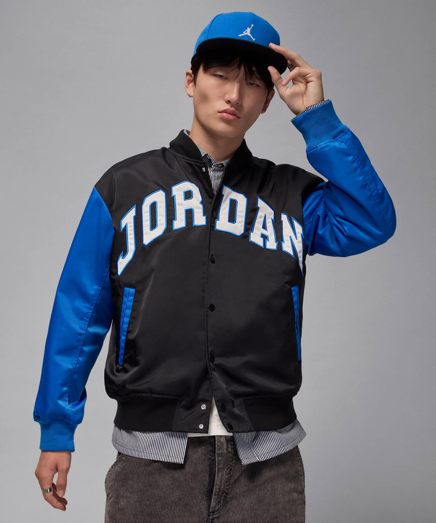 JORDAN BRAND M J BRK CLGTE VRSTY JKT BLACK/SPORT BLUE/BLACKの画像