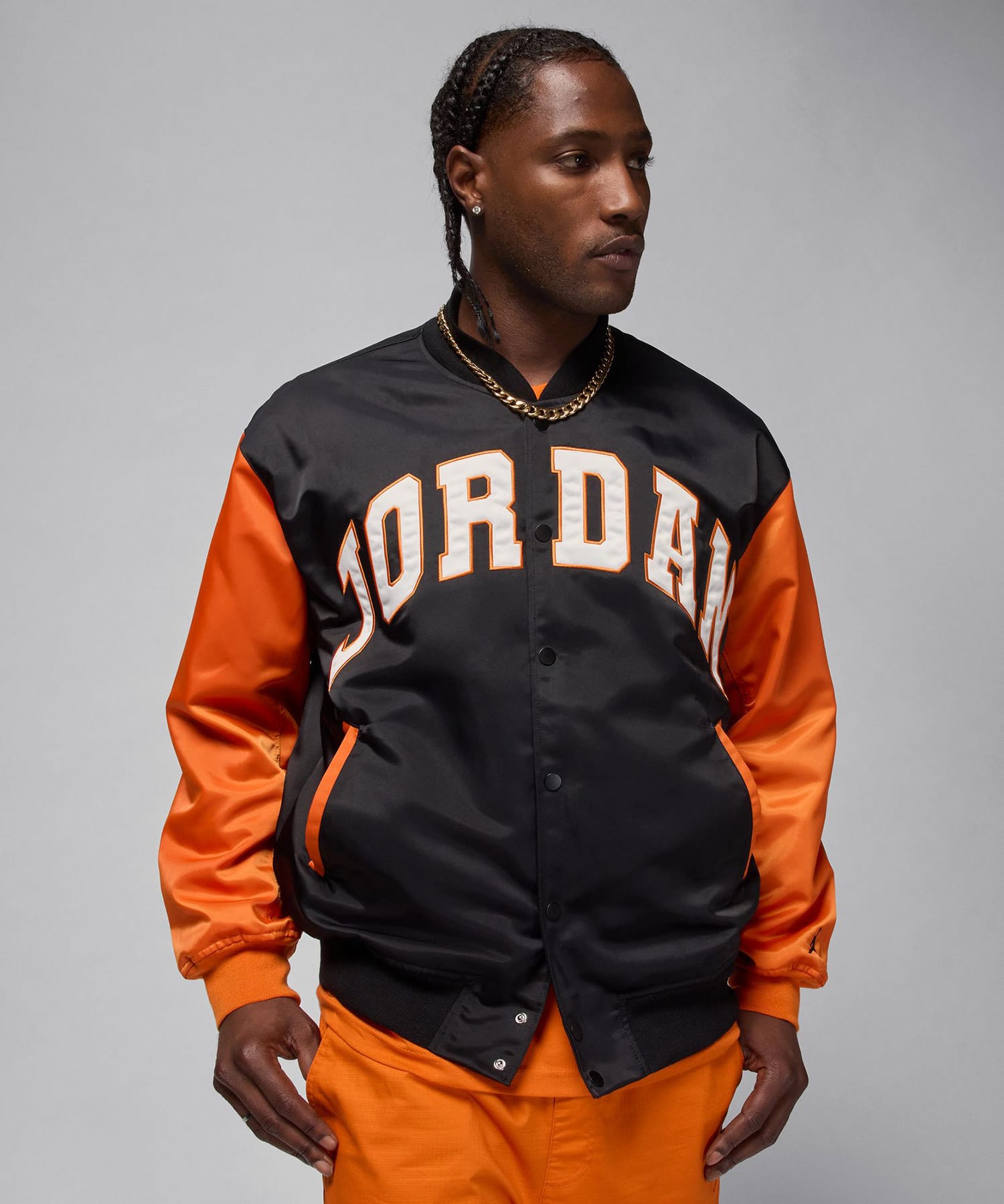 JORDAN BRAND M J BRK CLGTE VRSTY JKT BLACK/STARFISH/BLACKの画像