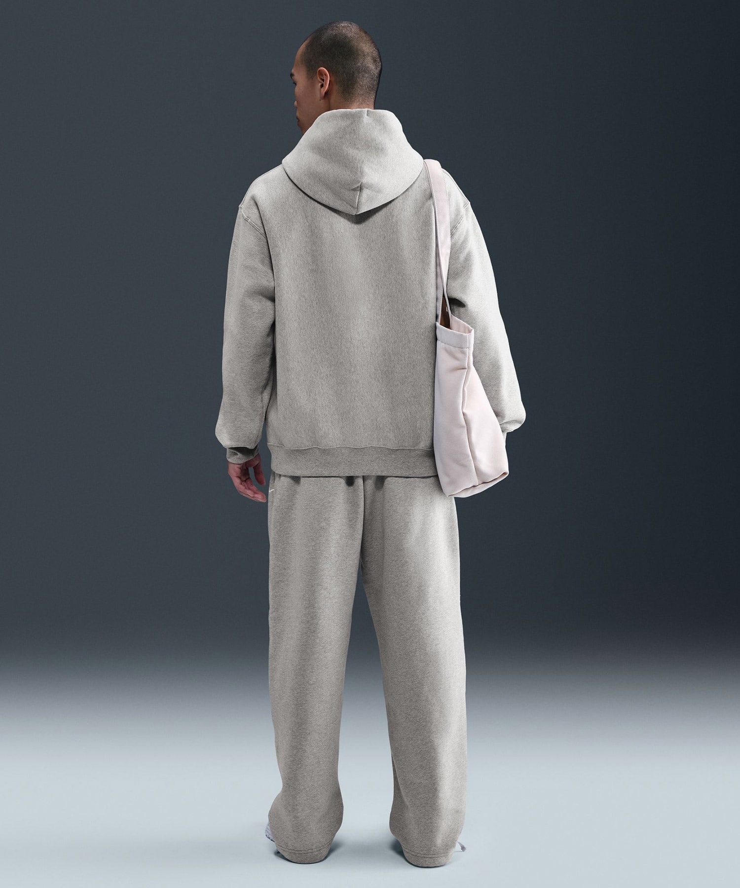 NIKE AS M NL SOLO SWSH BB PO HOODIE DK GREY HEATHER/LT SMOKE GREY/WHITEの画像