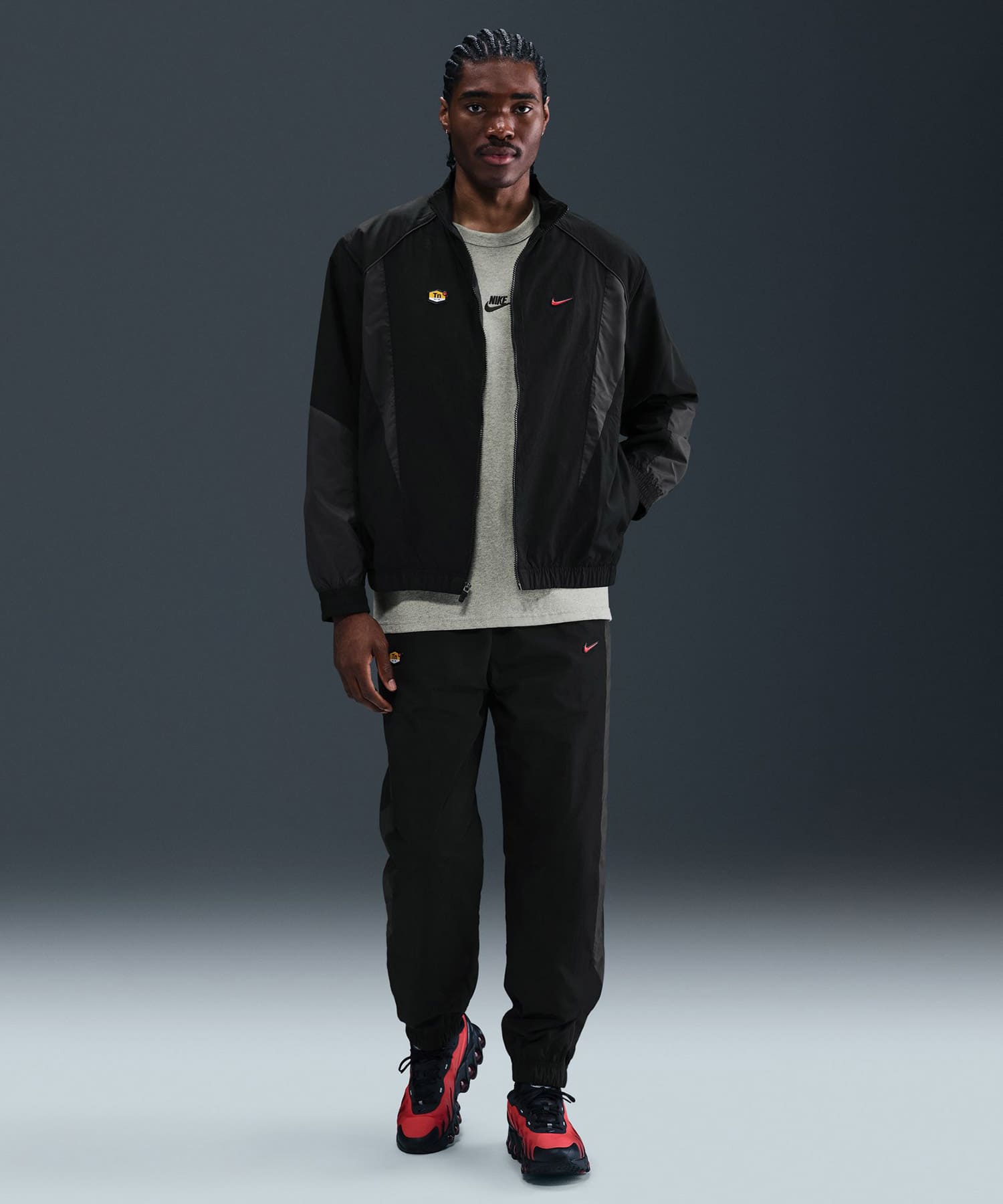 NIKE M NSW TN TRACKTOP WVN BLACK/DK SMOKE GREY/UNIVERSITY REDの画像