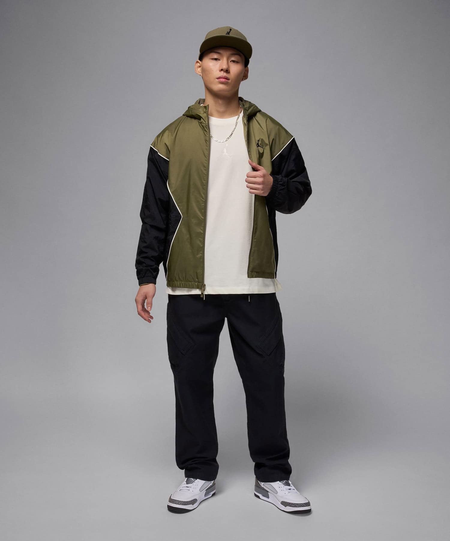 JORDAN BRAND M J FLT ESS OVSZ SS CREW IVORYの画像
