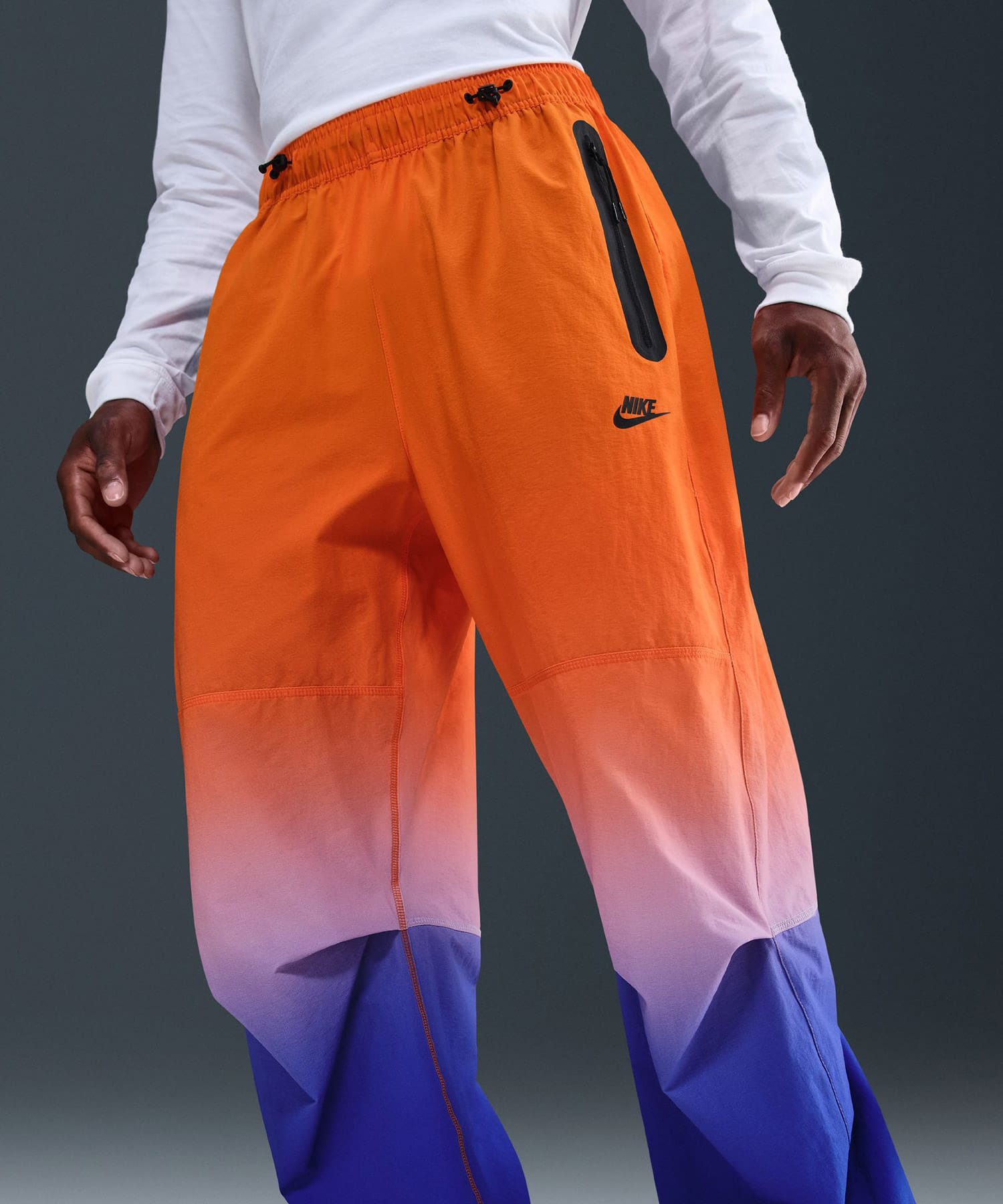 NIKE M NRG TCH WVN PANT OS 2 GAME ROYAL/SAFETY ORANGEの画像