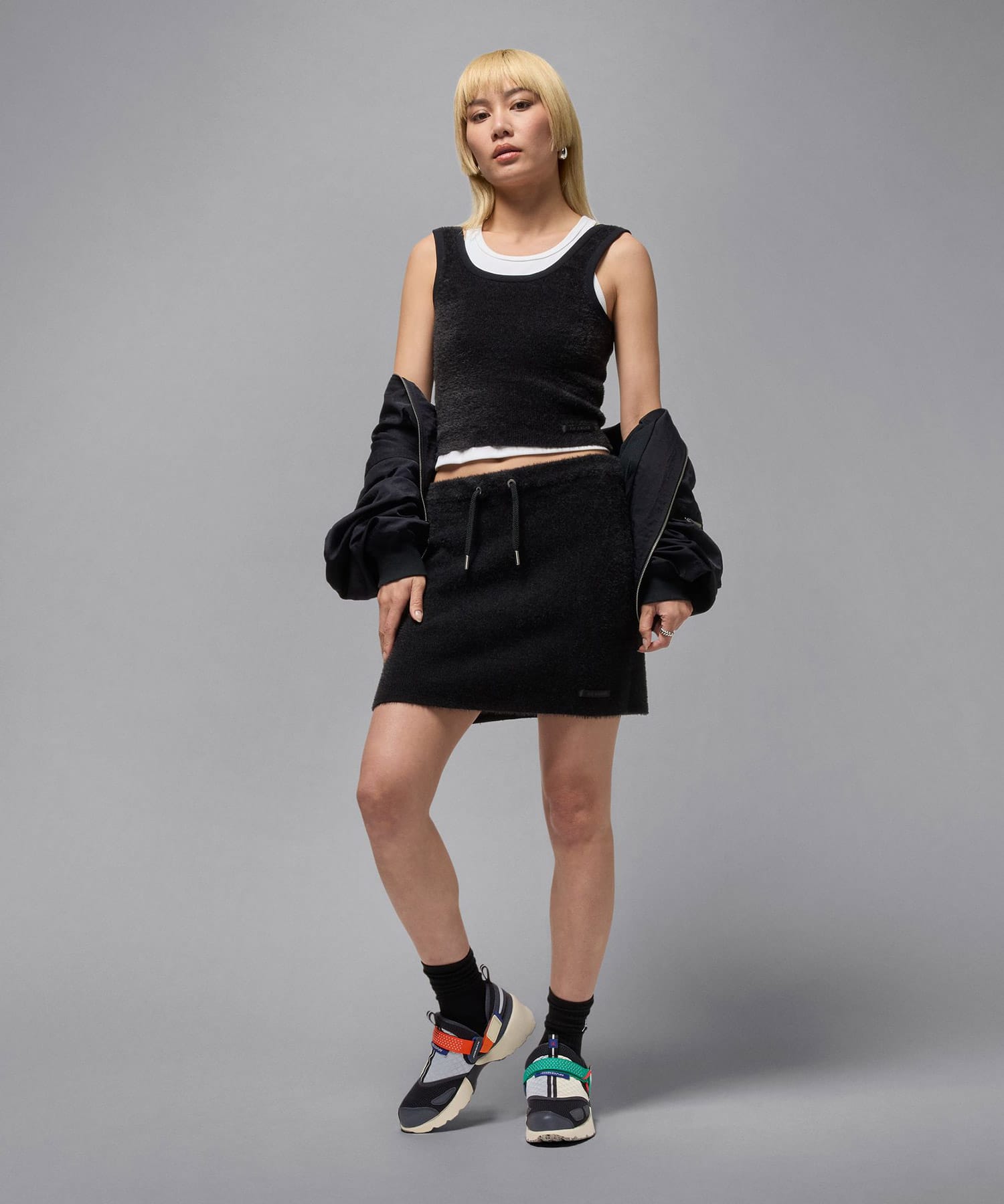 JORDAN BRAND WMNS JORDAN TRUNNER LX RA BLACK/WHITE-COCONUT MILK-ORANGE BLAZEの画像