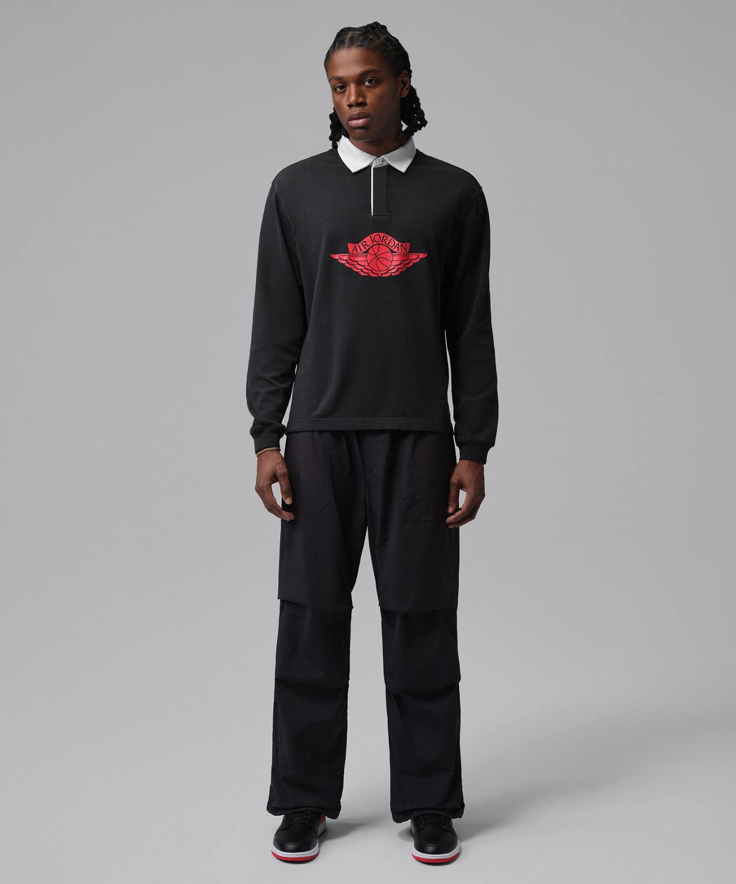 JORDAN BRAND M J FLT ESS RUGBY TOP BLACKの画像