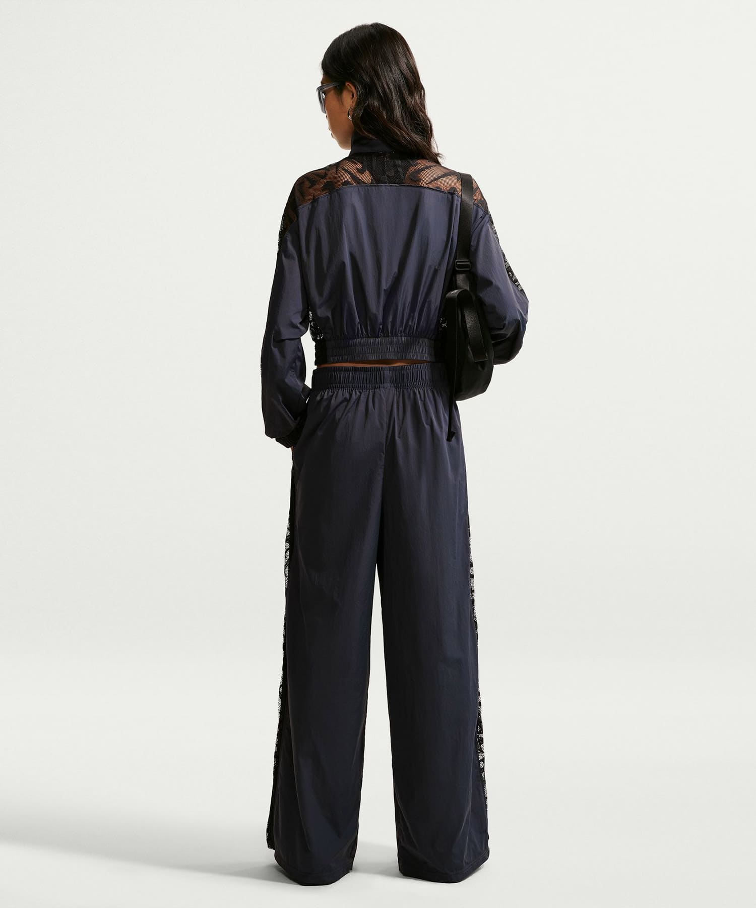 NIKE AS W NK LACE INSET TRACK PANT BLACKの画像