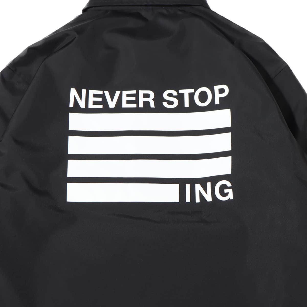 THE NORTH FACE NEVER STOP ING THE COACH JACKET BLACK