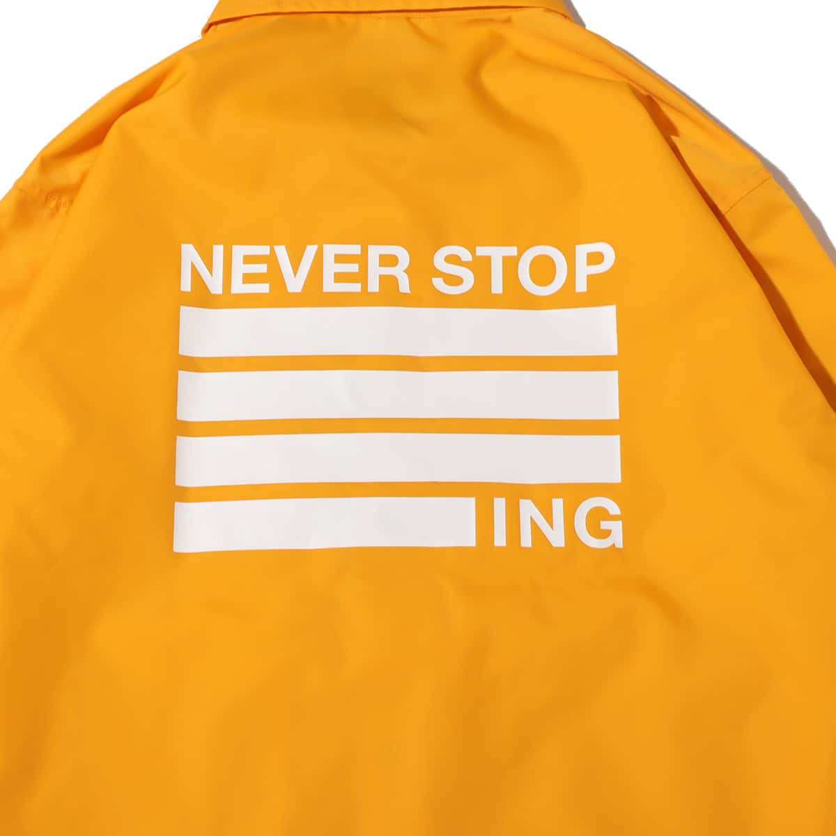 THE NORTH FACE NEVER STOP ING THE COACH JACKET サミットゴールド 23FW-I