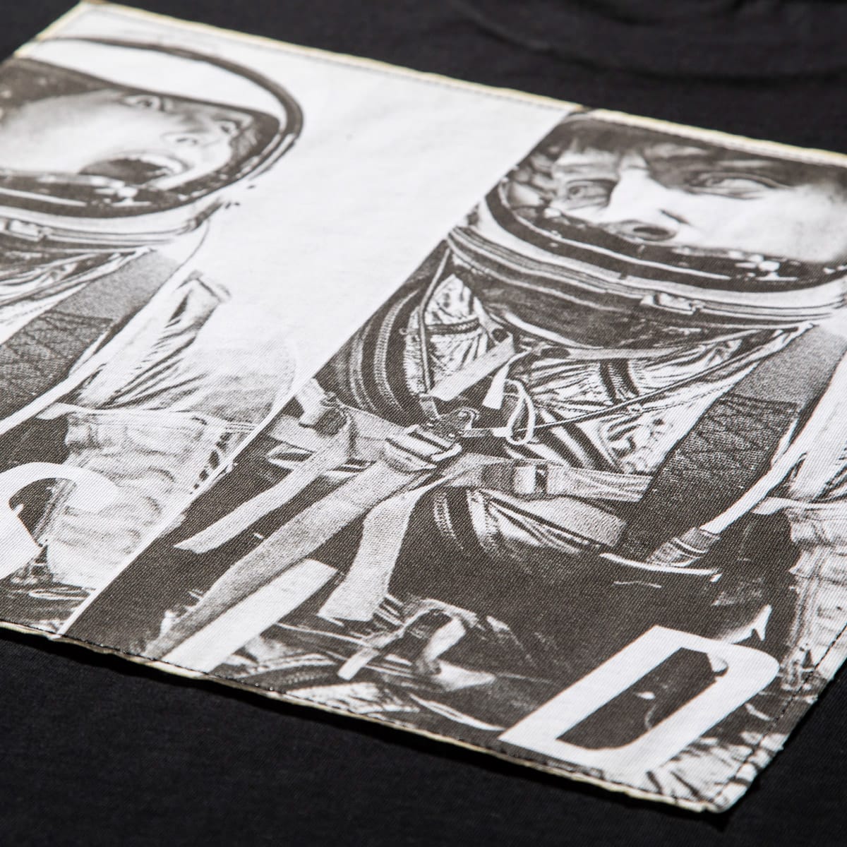 SOLID ASTRONAUT BACK PRINT T-SHIRT BLACK 21SU-Iの画像