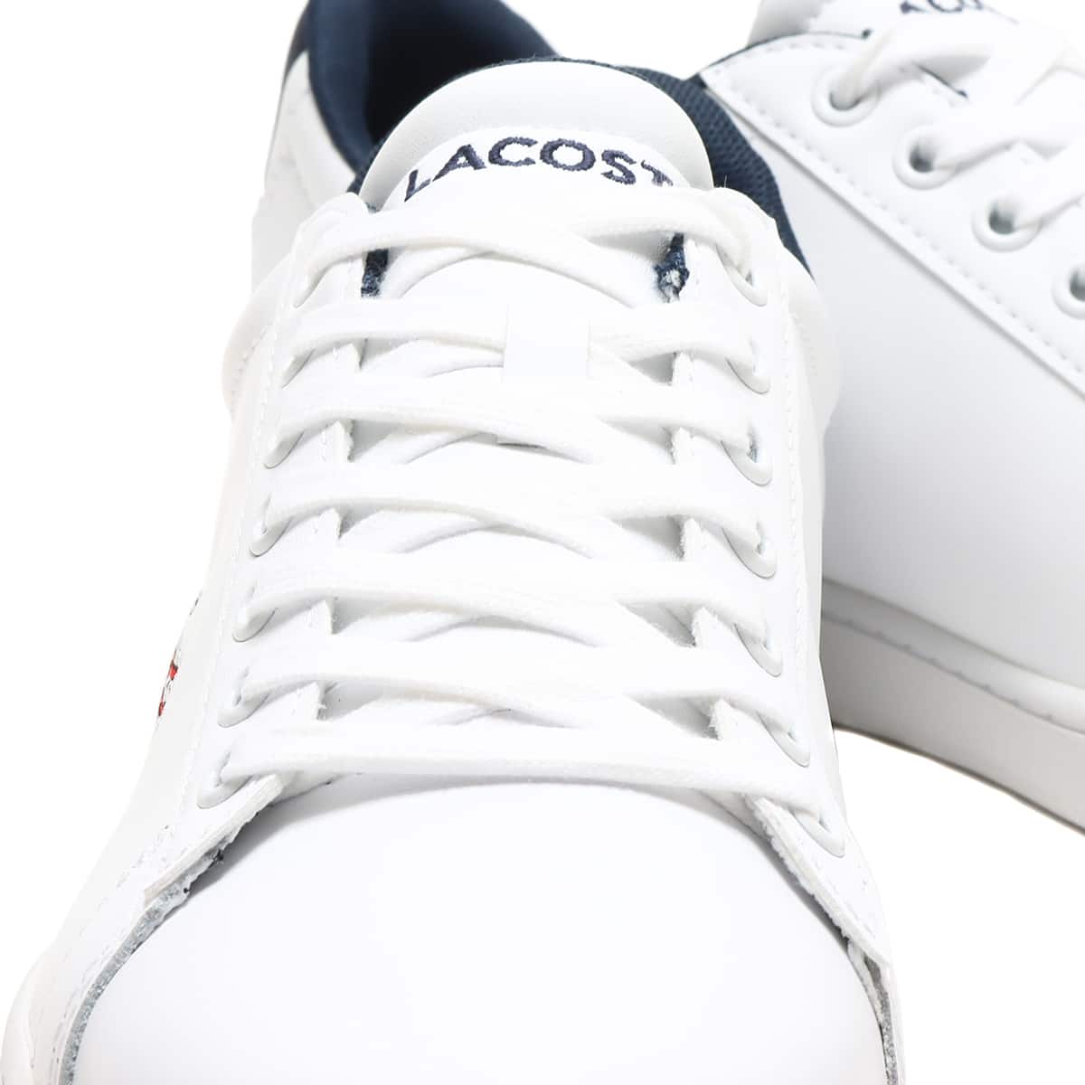 LACOSTE CARNABY EVO TRI 1 WHT/NVY/RED 22SU-Iの画像
