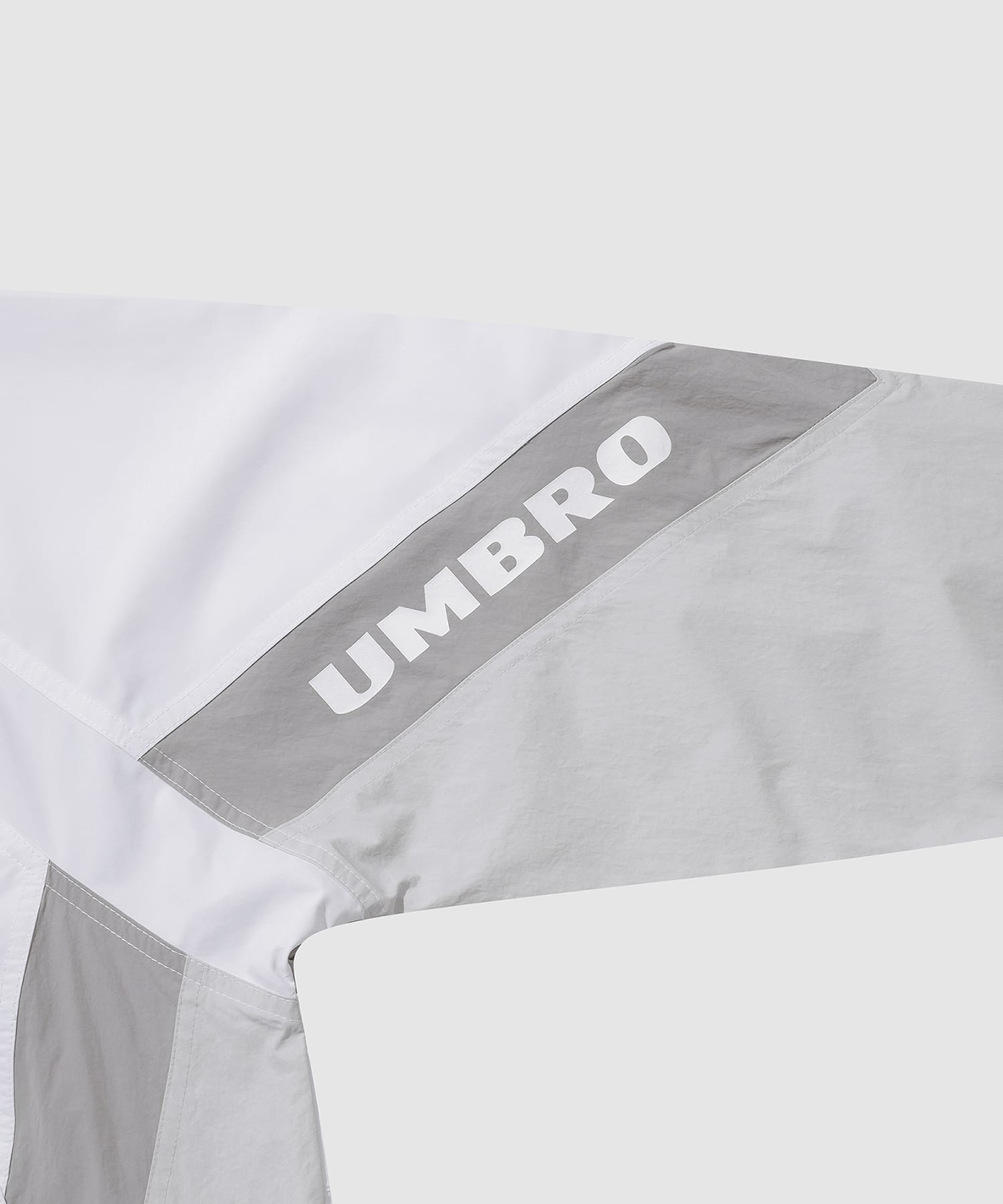 UMBRO 【KOREA COLLECTION】COLOR BLOCK STAND-NECK JACKET ホワイトの画像
