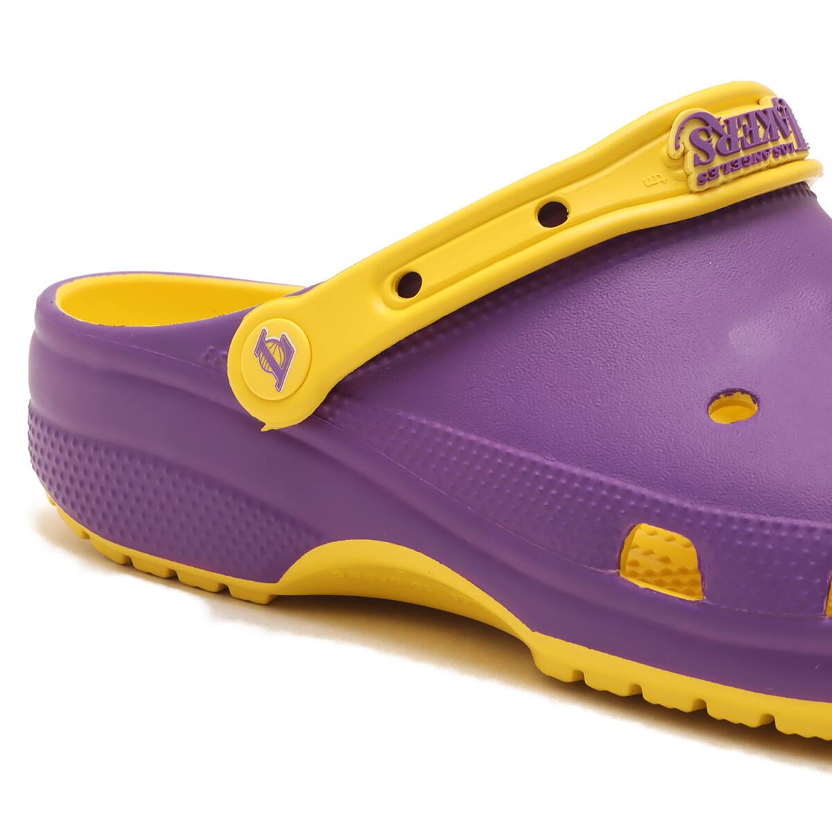 purple and gold crocs