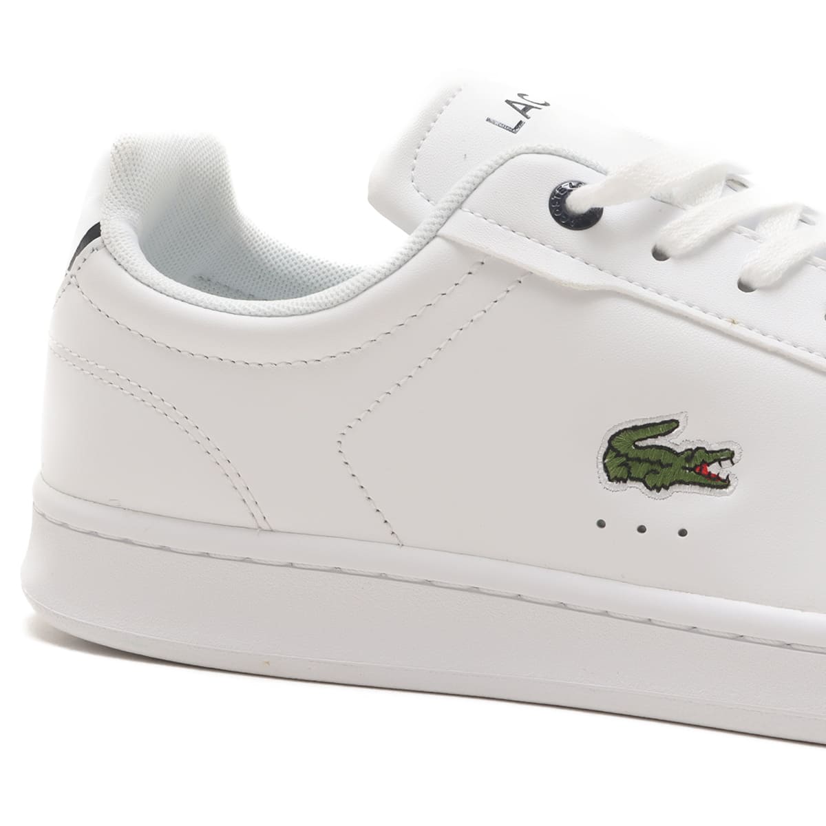 LACOSTE CARNABY PRO BL23 1 SMA WHT/NVY 24SP-Iの画像
