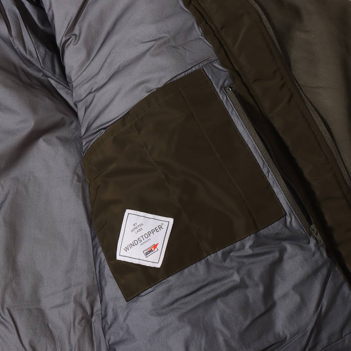 WHITE MOUNTAINEERING x WILD THINGS PRIMALOFT MONSTER PARKA KHAKI