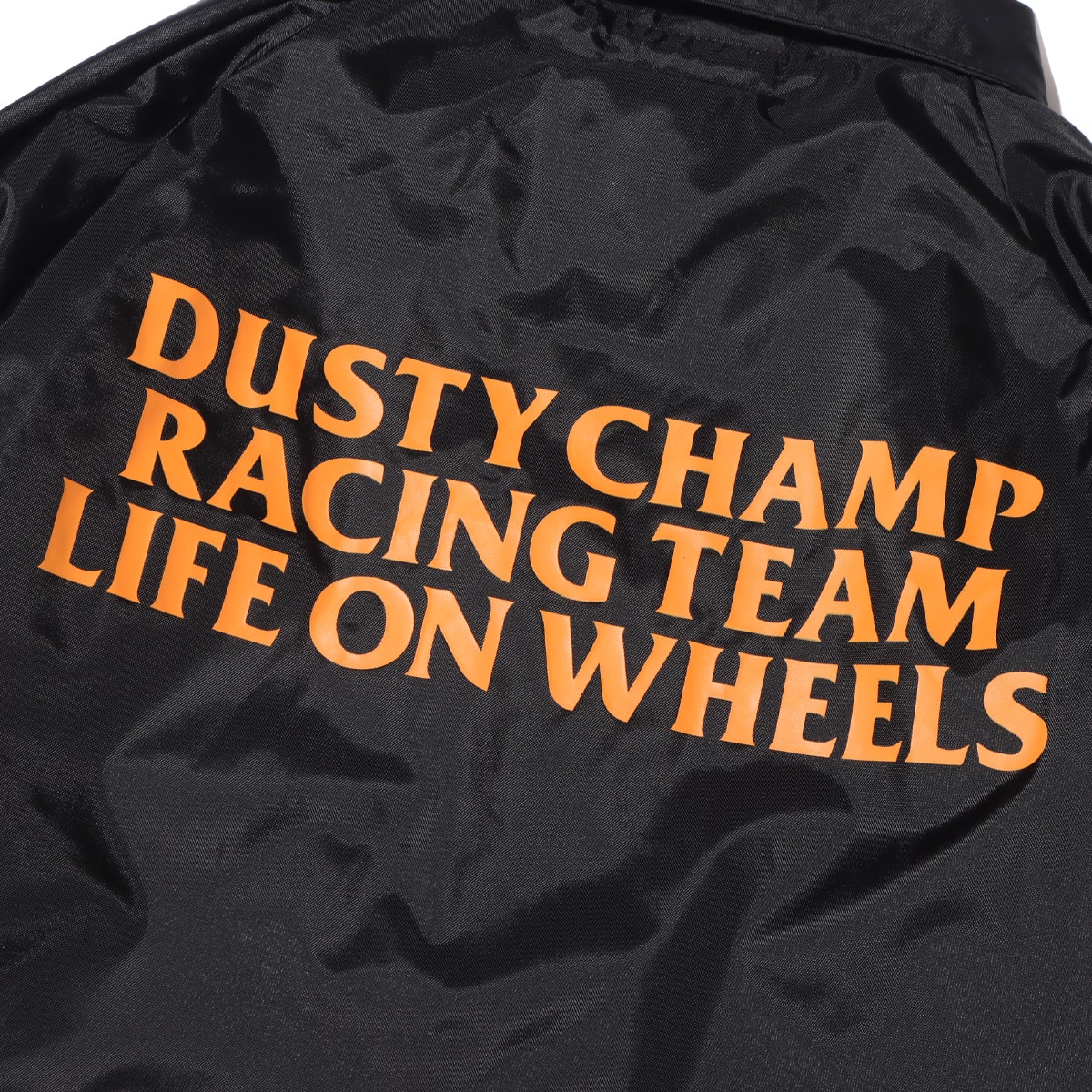 Dusty Champ TEAM JACKET BLACK/ORANGE 22SP-Iの画像